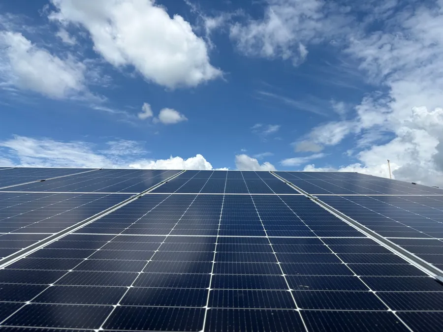 Residential solar panels installed on a house roof in India, illustrative photograph